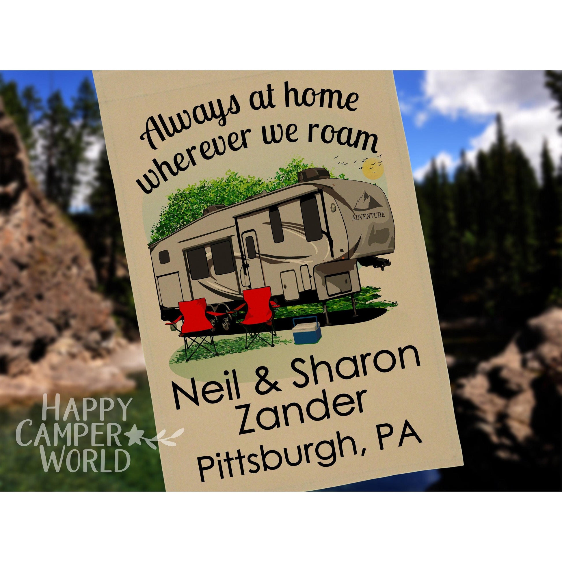 Thick, tan garden sized flag with large grey 5th wheel in a campsite. Includes green trees, a bright yellow sun with birds in the sky, 2 red camping chairs and a blue cooler. 3 lines of customizable text under the graphic.